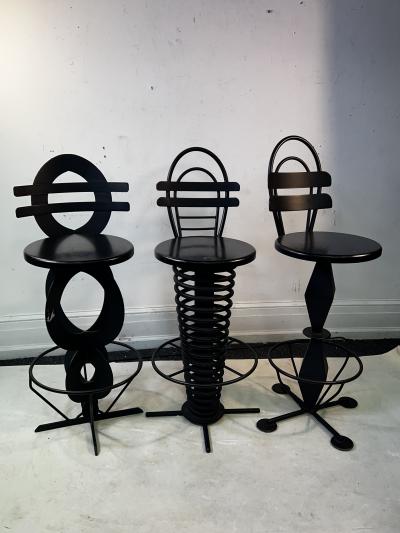 TRIO OF BLACK METAL AND WOOD POST MODERN BAR STOOLS