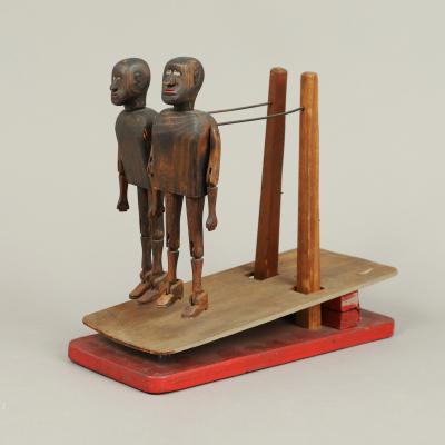 TWO ARTICULATED DANCING FIGURES