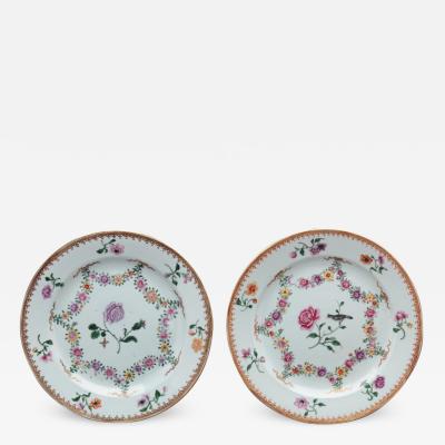 TWO NEARLY IDENTICAL CHINESE EXPORT PORCELAIN FAMILLE ROSE PLATES