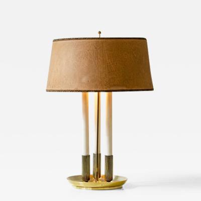 Table lamp with turned base and central stem in brass