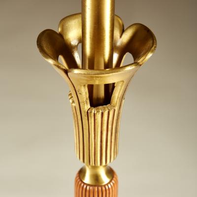 Tall pair of American wood and brass table lamps