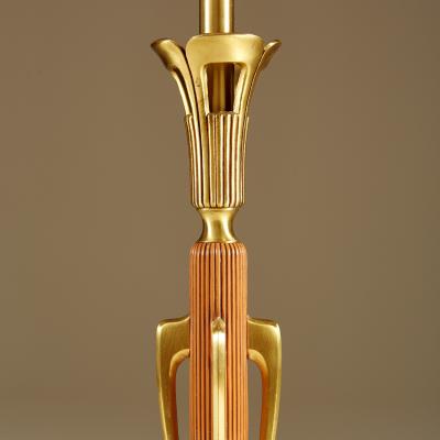 Tall pair of American wood and brass table lamps