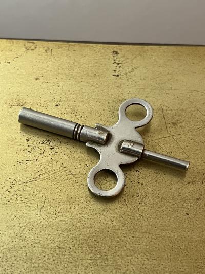 The New Haven Clock Company ANTIQUE BRASS AND GLASS REGULATOR CLOCK BY NEW HAVEN