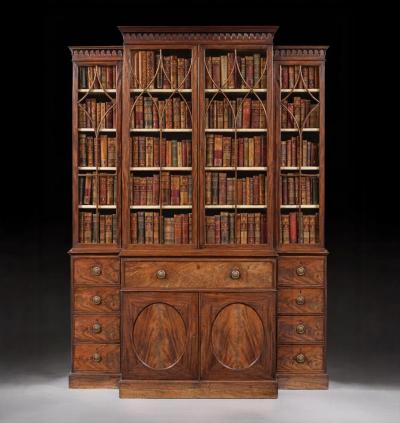 Thomas Chippendale A Fine and rare compact george III mahogany breakfront bookcase