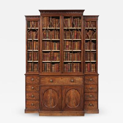 Thomas Chippendale A Fine and rare compact george III mahogany breakfront bookcase