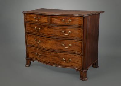 Thomas Chippendale A George III Serpentine Fronted Chest of Drawers in the Manner of Chippendale