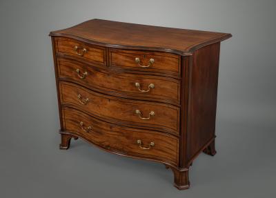 Thomas Chippendale A George III Serpentine Fronted Chest of Drawers in the Manner of Chippendale