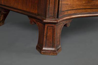 Thomas Chippendale A George III Serpentine Fronted Chest of Drawers in the Manner of Chippendale