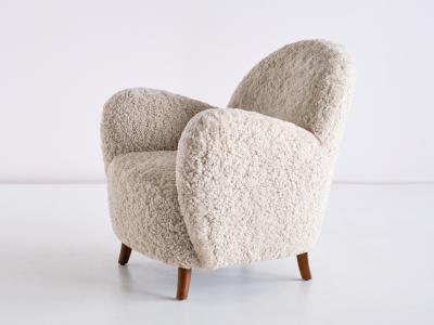 Thorald Madsens Pair of Thorald Madsen Armchairs in Sheepskin and Beech Denmark Mid 1930s