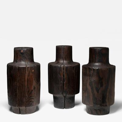 Three Burnished Solid Wood Sculptures