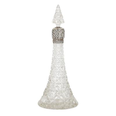 Three English sterling silver and cut glass bottles