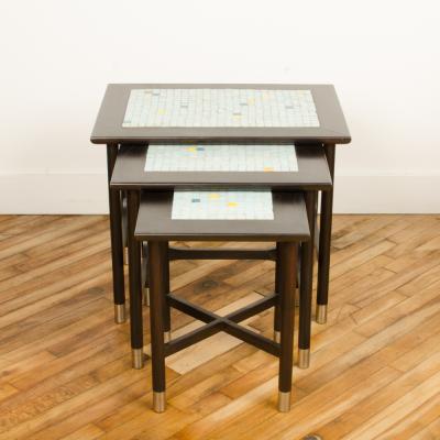 Three MCM nesting tables with tile inserts American in original condition
