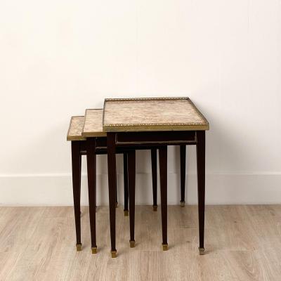 Three Nested Tables in Gilt Bronze and Marble