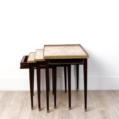 Three Nested Tables in Gilt Bronze and Marble