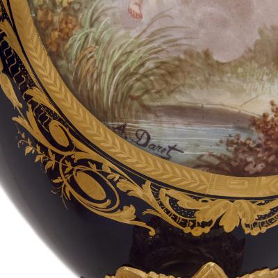 Three piece Louis XV Rococo style porcelain and ormolu clock set