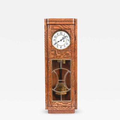 Tiger Oak Case Beveled Glass Trimmed Brass Wall Clock