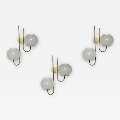 Tito Agnoli Tito Agnoli for Oluce sconces a set of 3