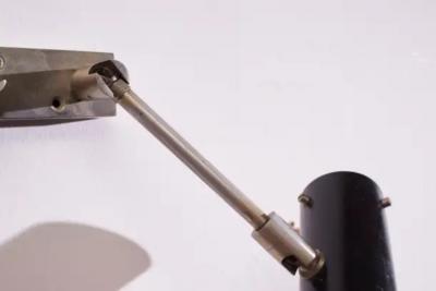 Tito Agnoli Tito Agnoli wall light with two adjustable diffusers by Oluce Italy 1950s