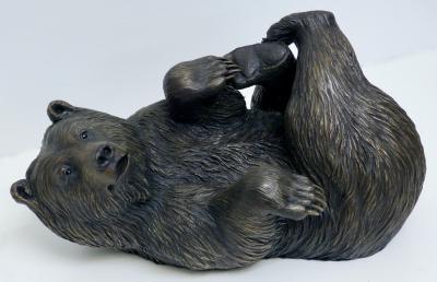 Tom Hjorleifson Chillin reclining grizzly