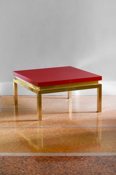 Tommaso Barbi China red lacquered coffee table with brass structure Tommaso Barbi Italy 1980