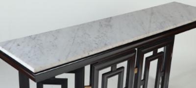 Tommi Parzinger A pair of Mid Century Modern ebonized marble top console tables circa 1950