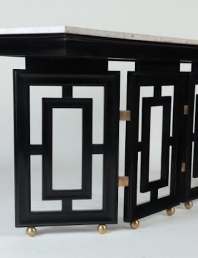 Tommi Parzinger A pair of Mid Century Modern ebonized marble top console tables circa 1950