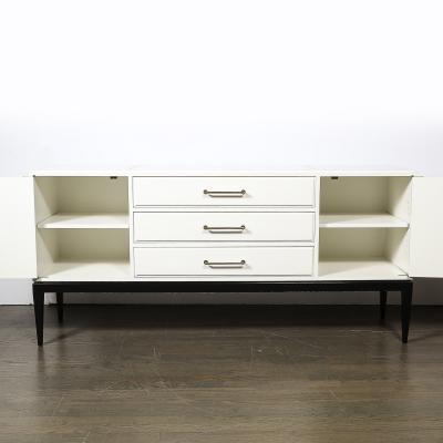 Tommi Parzinger Mid Century Cream Lacquer w Black Lacquer Supports Sideboard by Tommi Parzinger
