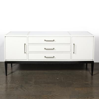 Tommi Parzinger Mid Century Cream Lacquer w Black Lacquer Supports Sideboard by Tommi Parzinger