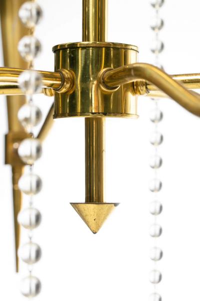 Tommi Parzinger Tommi Parzinger Hollywood Regency Chandelier of Flowing Crystals and Brass