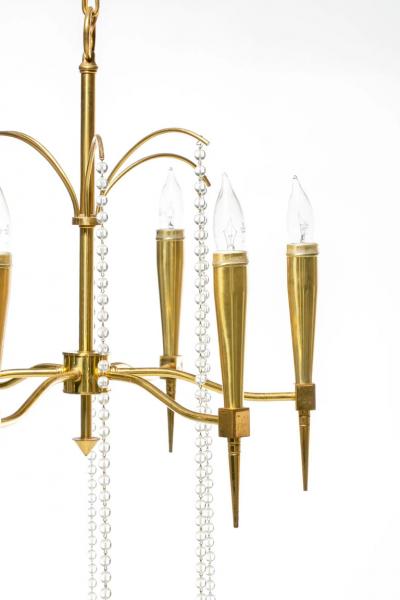 Tommi Parzinger Tommi Parzinger Hollywood Regency Chandelier of Flowing Crystals and Brass