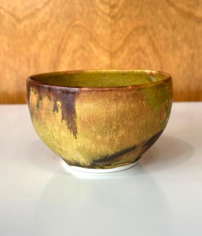 Toshiko Takaezu Ceramic Tea Bowl with Mottled Yellow Glaze by Toshiko Takaezu