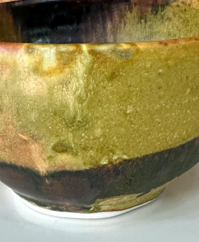 Toshiko Takaezu Ceramic Tea Bowl with Mottled Yellow Glaze by Toshiko Takaezu