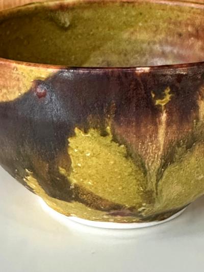 Toshiko Takaezu Ceramic Tea Bowl with Mottled Yellow Glaze by Toshiko Takaezu