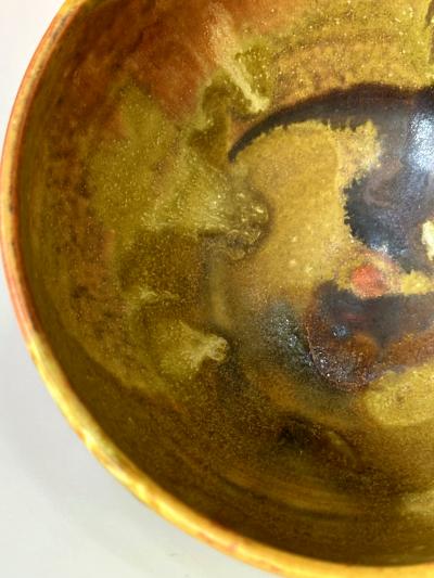 Toshiko Takaezu Ceramic Tea Bowl with Mottled Yellow Glaze by Toshiko Takaezu