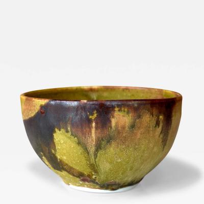 Toshiko Takaezu Ceramic Tea Bowl with Mottled Yellow Glaze by Toshiko Takaezu
