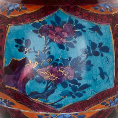 Two Chinese Qing dynasty porcelain vases with gilt bronze bases