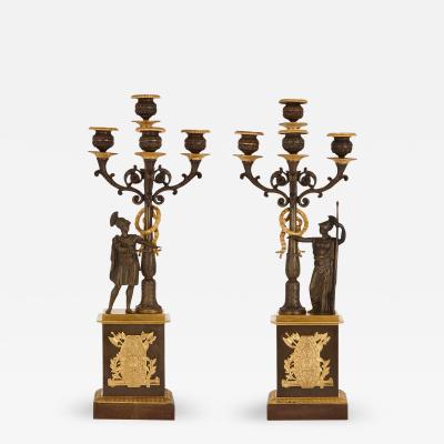 Two Empire style gilt and patinated bronze candelabra