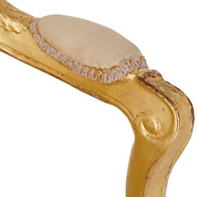 Two Louis XVI style giltwood upholstered fauteuil armchairs
