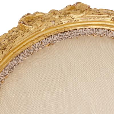 Two Louis XVI style giltwood upholstered fauteuil armchairs