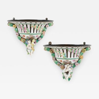 Two Meissen style decorative porcelain wall brackets