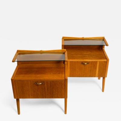 Two Mid Century Italian bedside tables made of oak with teak veneer and glass