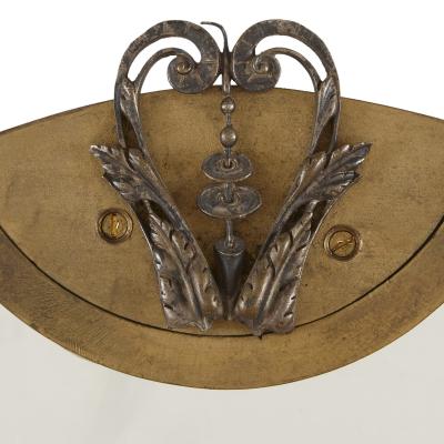 Two Rococo style gilt and silvered metal girandoles