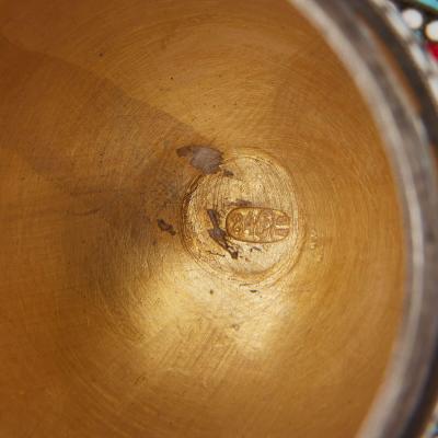 Two Russian silver gilt and cloisonn enamel Easter eggs on stands