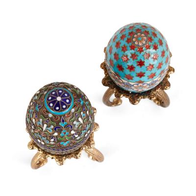 Two Russian silver gilt and cloisonn enamel eggs on stands