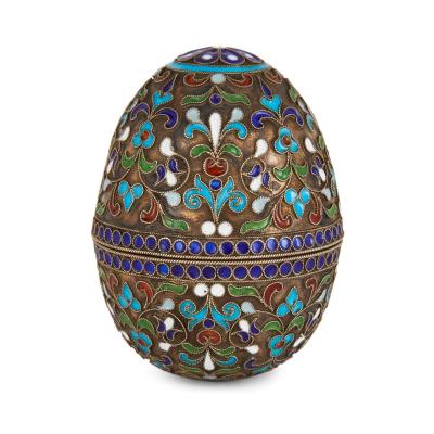 Two Russian silver gilt and cloisonn enamel eggs on stands
