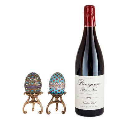 Two Russian silver gilt and cloisonn enamel eggs on stands