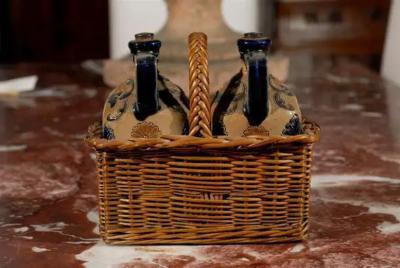 Two Victorian English Pottery Decanters in Tantalus Inspired Wicker Basket
