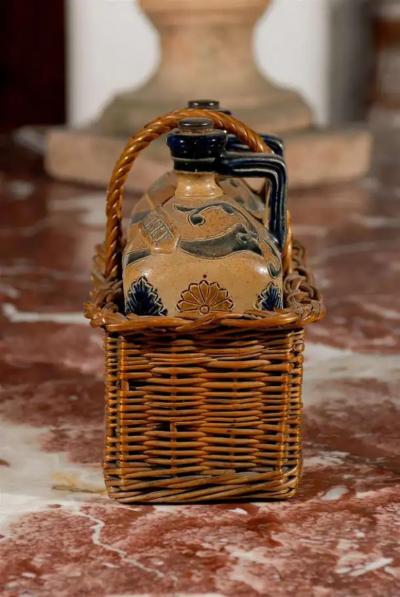 Two Victorian English Pottery Decanters in Tantalus Inspired Wicker Basket