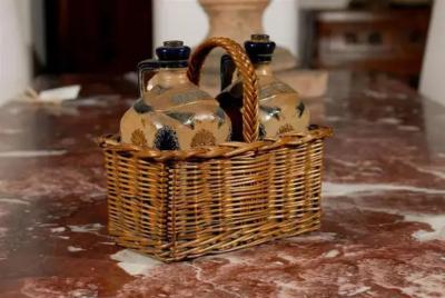 Two Victorian English Pottery Decanters in Tantalus Inspired Wicker Basket
