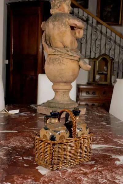 Two Victorian English Pottery Decanters in Tantalus Inspired Wicker Basket